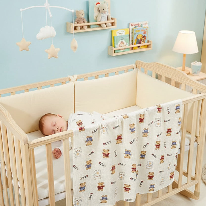 Bébé dort paisiblement avec Bebe plaid PETITS PAS