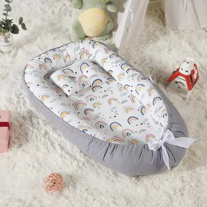 Cocon bébé ergonomique nidportablebebe arc-en-ciel