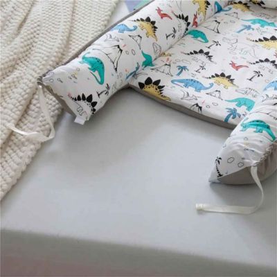 Cocon bébé nid douillet coton CozyCocoon DINOSAURE
