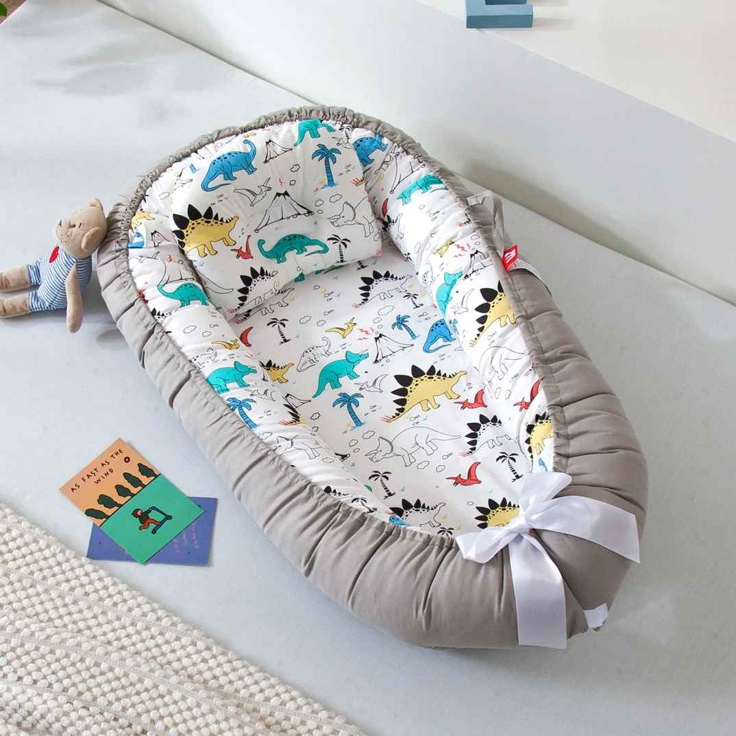 Cocon bébé nid douillet sommeil paisible pratique CozyCocoon DINOSAURE