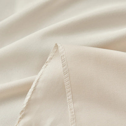 Détail tissu voile pour berceau beige avec finitions froncées Cocon Protecteur