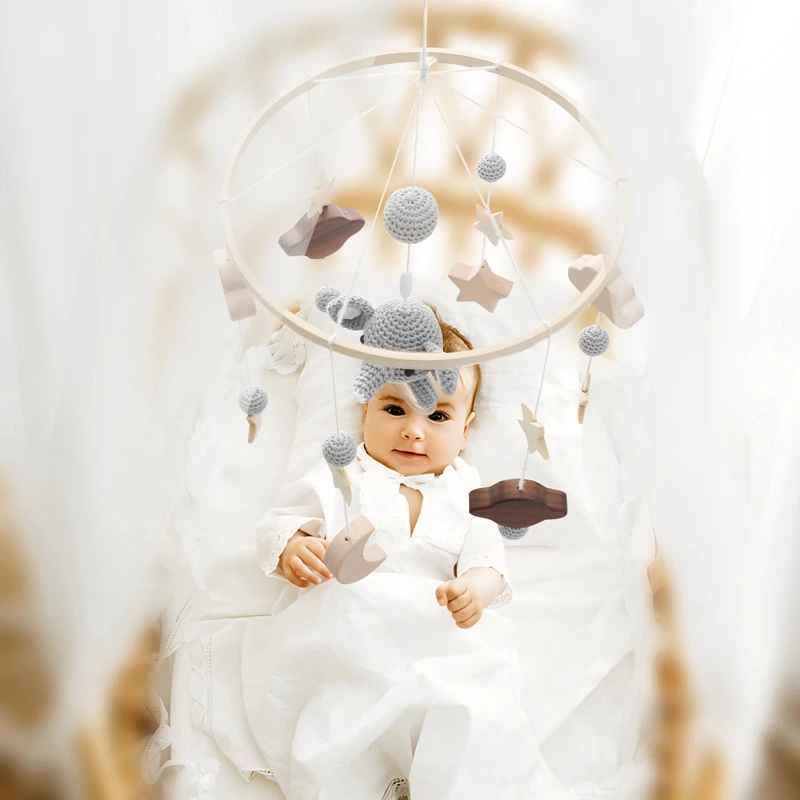 Mobile bébé sommeil serein tricoté Bois et Laine Éveil Artisanal