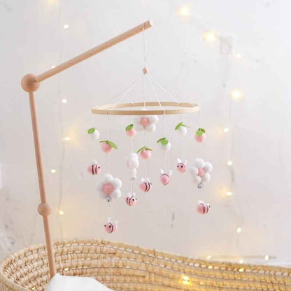 Mobile pour bébé en bois naturel dans couffin Eveil Douceur