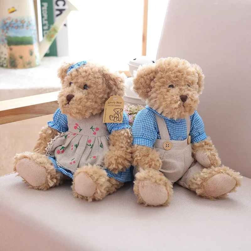 Ours en peluche bleu robe combinaison DuoTendre