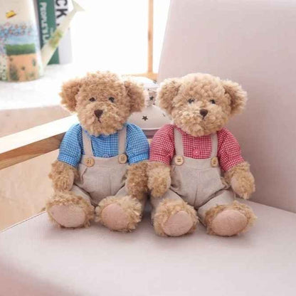 Ours en peluche rose bleu sur fauteuil DuoTendre