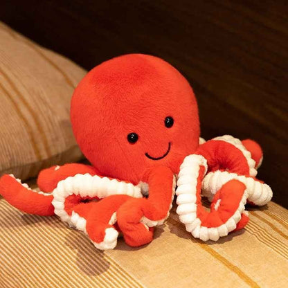 Peluche Pieuvre souriante Doudou apaisant Orange
