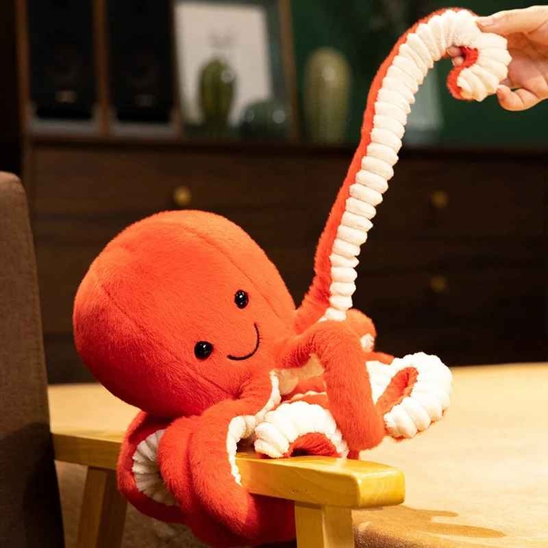 Peluche Pieuvre souriante apaisante Doudou apaisant Orange