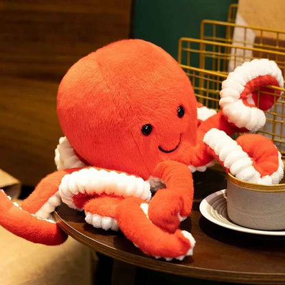Peluche Pieuvre souriante certifiée Doudou apaisant Orange
