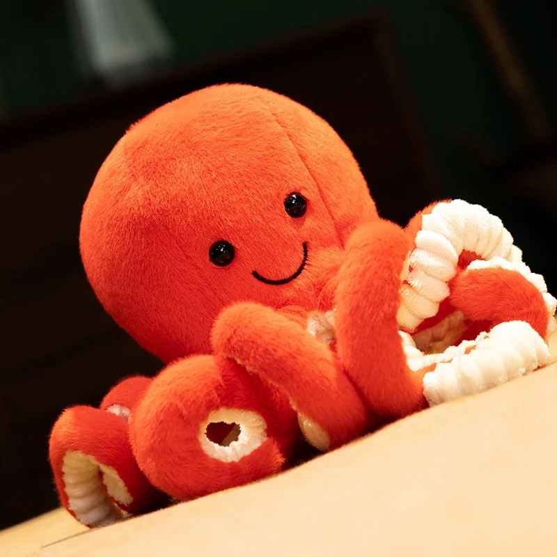 Peluche Pieuvre souriante sans danger Doudou apaisant Orange