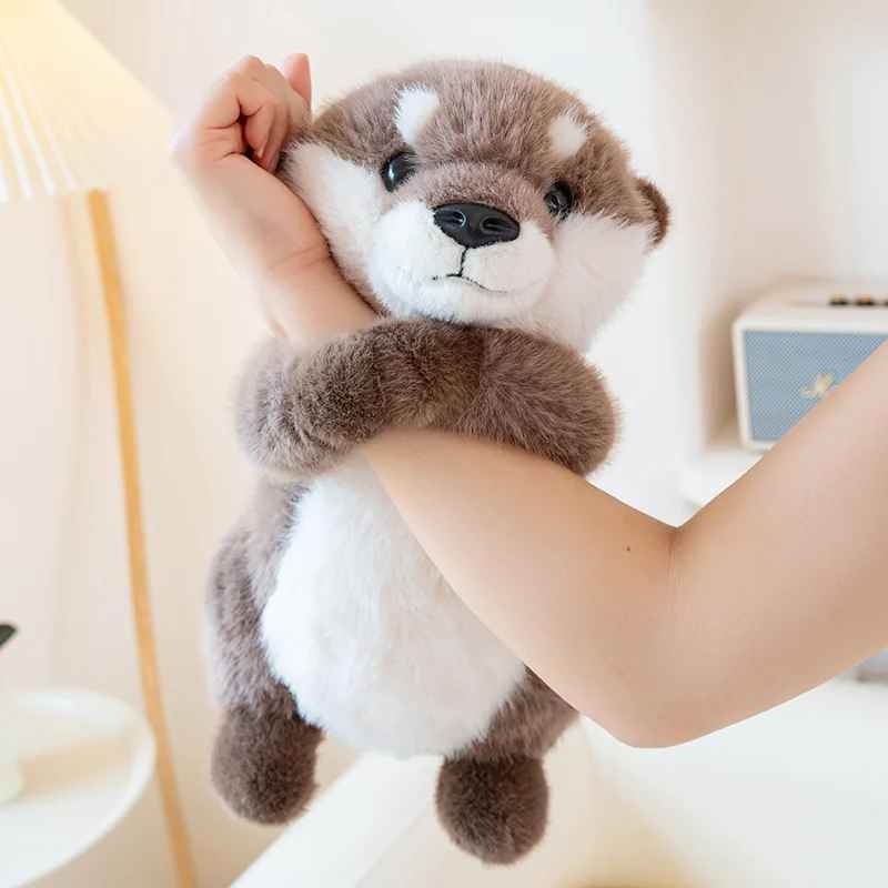 Peluche loutre douce accrocheuse Observatrice