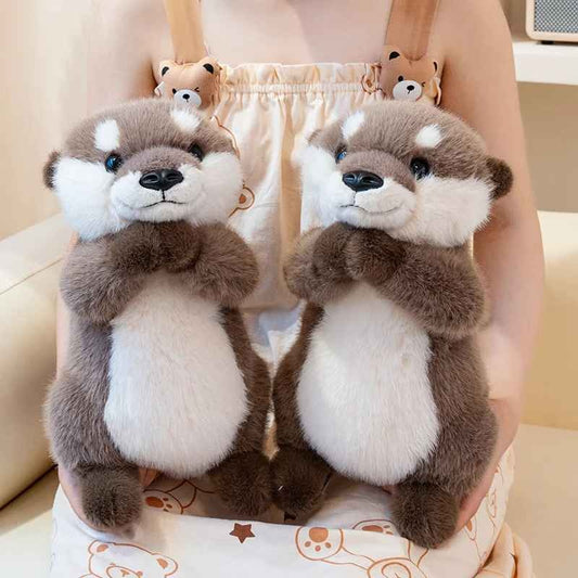 Peluche loutre douce éveilleuse Observatrice