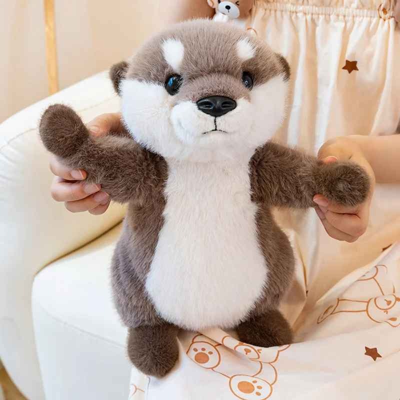 Peluche loutre douce stimulante Observatrice