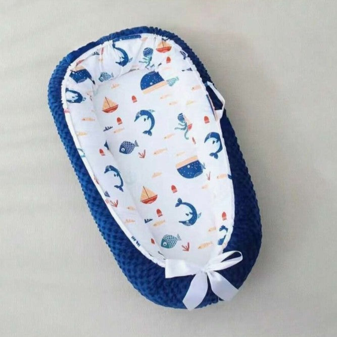 Réducteur bebe motifs marin bleu Cocon Marin