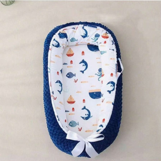 Réducteur bebe motifs marin bleu confortable Cocon Marin