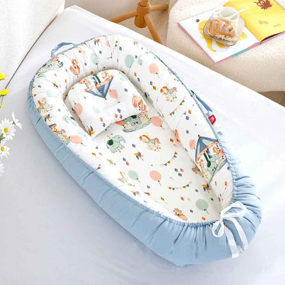 Réducteur de lit bebe avec poignée Cocon Sécurisé
