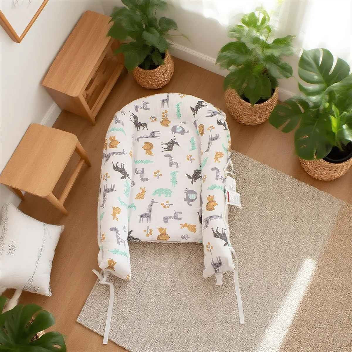 Réducteur de lit bébé cocon en coton respirant ajustable Cocoon Baby