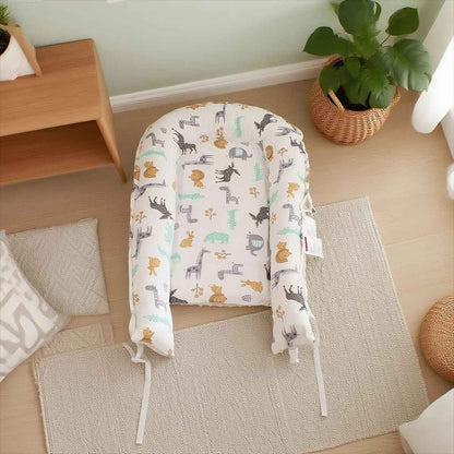 Réducteur de lit bébé cocon en coton respirant évolutif Cocoon Baby