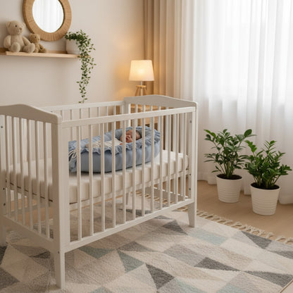 Réducteur de lit bébé dans berceau CoconBébé Gris