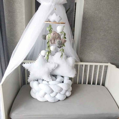 Tresse tour de lit enroulée dans berceau CozyKnot Blanc