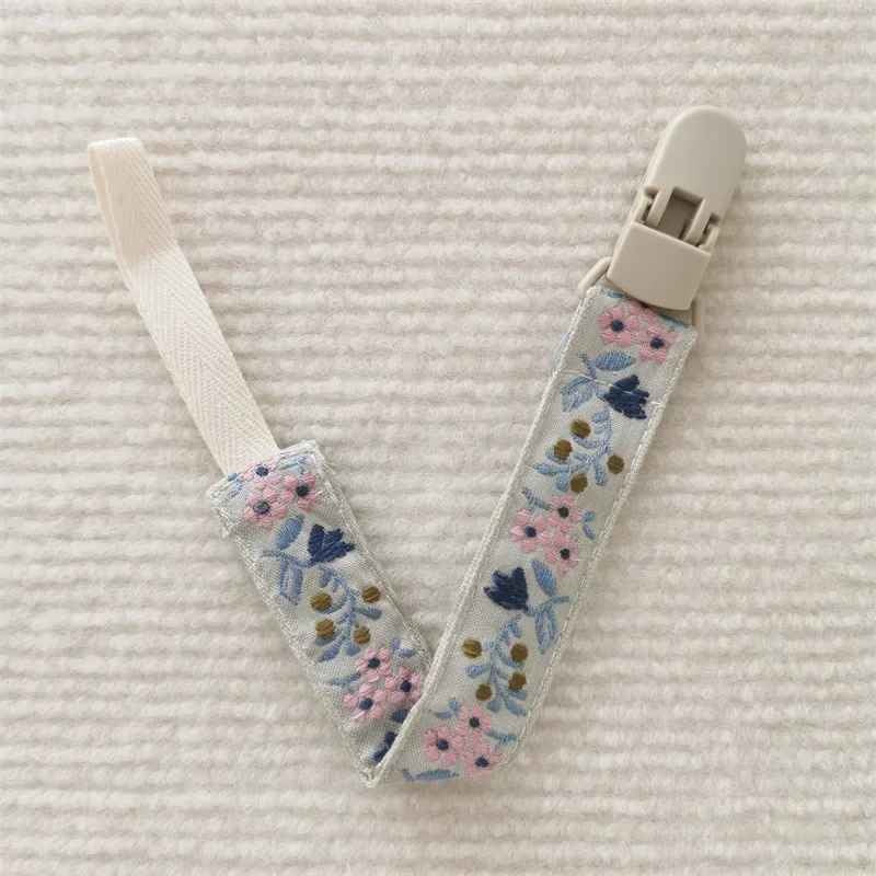 Attache tetine douce bleue Sécurité Stylée