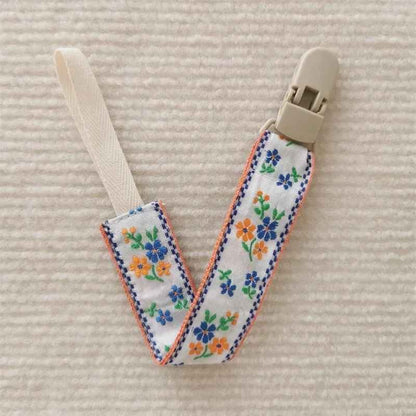 Attache tetine orange Sécurité Stylée