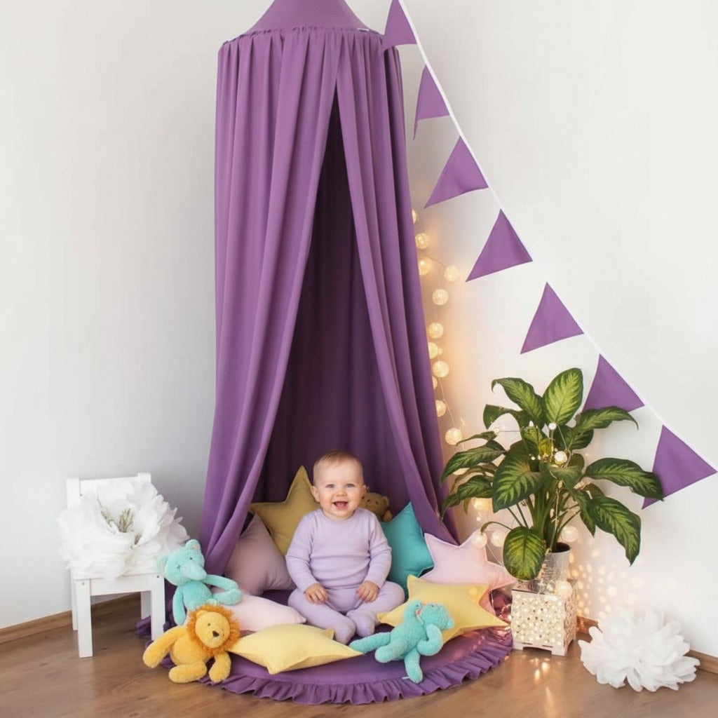 bébé souriant sous Voile pour lit bebe Cocon Nuit