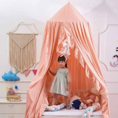 Ciel de lit bebe coin jeux chaleureux dreamynest rose pêche