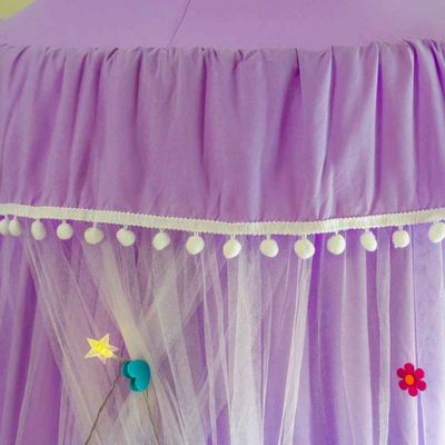 Ciel de lit bébé motif pompom twinkle nest violet