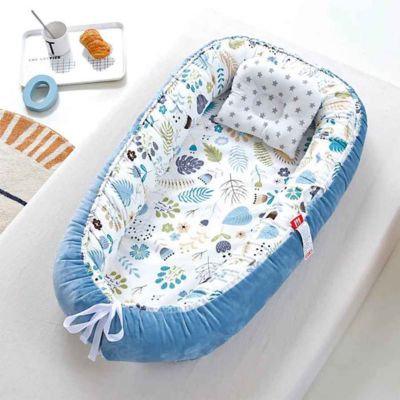 cocon pour bebe confortable bleu avec fleurs BabyNest NidouVelours