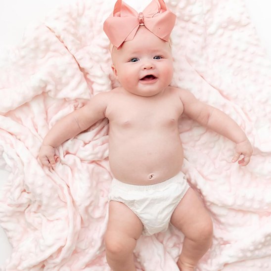 Couverture bébé douce rose polyvalente - Douillette et Sécurisante