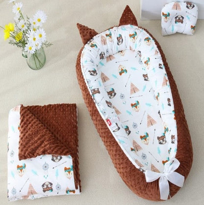 reducteur cododo avec couverture et coussin assortis cocoon