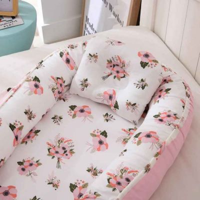 Réducteur de lit bébé cocon douillet NidPortableBébé Rose