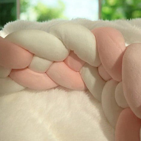 tresse de lit bébé douce chaleureuse cozyknot rose blanc