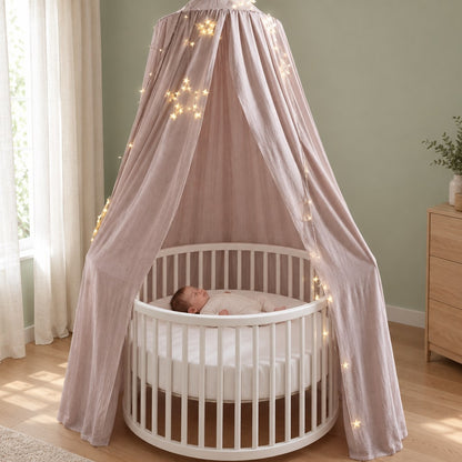 voile berceau suspendu sur berceau rond dome rose claire